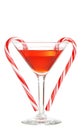 Red martini with candy canes Royalty Free Stock Photo