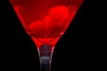 Red martini cocktail closeup and cherries Royalty Free Stock Photo