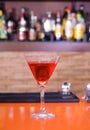Red martini drink cocktail in a bar Royalty Free Stock Photo
