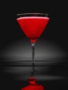 Red martini glass in water Royalty Free Stock Photo