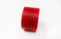 Red masking tape roll isolated on white background. Royalty Free Stock Photo