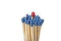 Red Match in group of blue matches