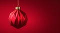 Red matt Christmas ball hanging on golden string