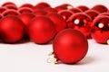 Red matt christmas ball and other bauble on white background Royalty Free Stock Photo