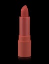 Red matte lipstick isolated on black background. Velvet satin airy lip stick Royalty Free Stock Photo
