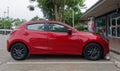 Red Mazda 2 model 2015