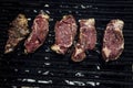Red Meat Preparetion on a grill Royalty Free Stock Photo
