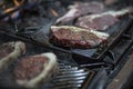Red Meat Preparetion on a grill Royalty Free Stock Photo