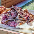 Red meat ribs wild prey hunting closeup delicious grilling on a wooden table party resting