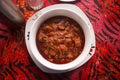 Red Meat Sauce or Beef Gravy in a white bowl - Top view Royalty Free Stock Photo