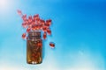 Red medical pills and tablets spilling out of a drug bottle. Pharmaceutical medical treatment healthcare concept. Royalty Free Stock Photo