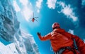 Red Medical Rescue helicopter landing in high altitude Himalayas mountains. High Himalayas expedition during mount climbing. Royalty Free Stock Photo