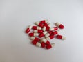 Red medication capsules