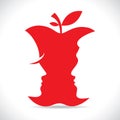 Red men and women face cutout in apple