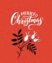 Red Merry Christmas card with calligraphy text and branch of rose hip branch with leaves. Scandinavian greeting card Royalty Free Stock Photo