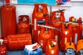 Red metal cylinders for propane gas