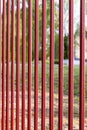 Red metal fence