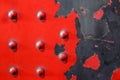 Red metal plate background - riveted industrial steel