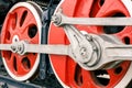 Red metal wheels of an old steam locomotive Royalty Free Stock Photo