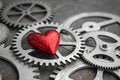 Red Metallic Heart Among Interlocking Gears - generated by ai Royalty Free Stock Photo