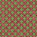 Red metallic ornament on green background. Royalty Free Stock Photo