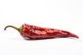 a red mexican dried chili pepper on a white background, created by Generative AI