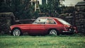 Red MGB car parked on grassland Royalty Free Stock Photo