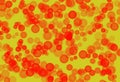 Red micro bubble splash on yellow background