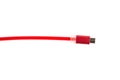 Red micro usb connector cable on white isolated background. Horizontal frame Royalty Free Stock Photo