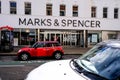 Red Mini Car Parked Outside Marks And Spencer