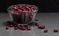 Red mini kidney beans measured in cup Phaseolus vulgaris Royalty Free Stock Photo