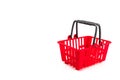 Red mini shopping cart on a white background, emphasizing its structure and mobility. m Royalty Free Stock Photo