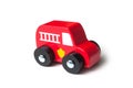 Red miniature wooden truck on white background - concept fire rescue Royalty Free Stock Photo