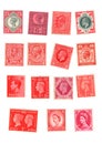 Red mint vintage postage stamps from the United Kingdom.