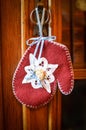 Red Mitten Christmas Ornament with Blue Ribbon Royalty Free Stock Photo