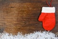 Red mitten on wooden background Royalty Free Stock Photo