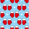 Red mittens and white snowflakes on blue background. Seamless vector pattern. Christmas background for festive designs Royalty Free Stock Photo