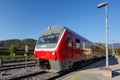 Red modern commuter passenger train in Kamnik Slovenia