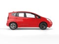 Red modern compact electric car - side view