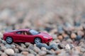 Toy car on gravel