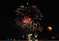 Red moon and fireworks near river in night Royalty Free Stock Photo