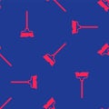 Red Mop icon isolated seamless pattern on blue background. Cleaning service concept. Vector Royalty Free Stock Photo