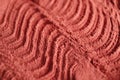 Red moroccan cosmetic clay powder texture close up, selective focus.