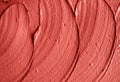 Red moroccan cosmetic clay texture close up.