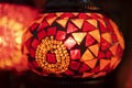 Red Moroccan lamp with red glass mosaic design. Oriental style