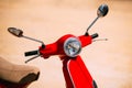 Red motorbike, motorcycle scooter parked in city Royalty Free Stock Photo