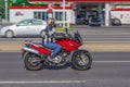 Red Motorcycle driving on high speed Royalty Free Stock Photo