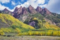 Red mountain peaks and fall colors at Maroon Bells valley with fall colors in Aspen Colorado USA Royalty Free Stock Photo