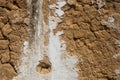 Red mud and stones plaster wall Royalty Free Stock Photo