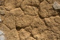 Red mud and stones plaster wall Royalty Free Stock Photo